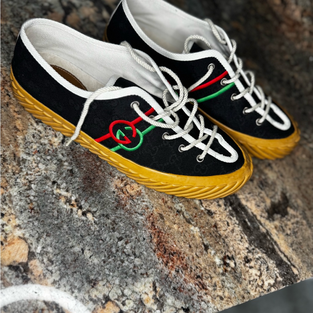 Black And Gold Sneakers With Red And Green Stripe